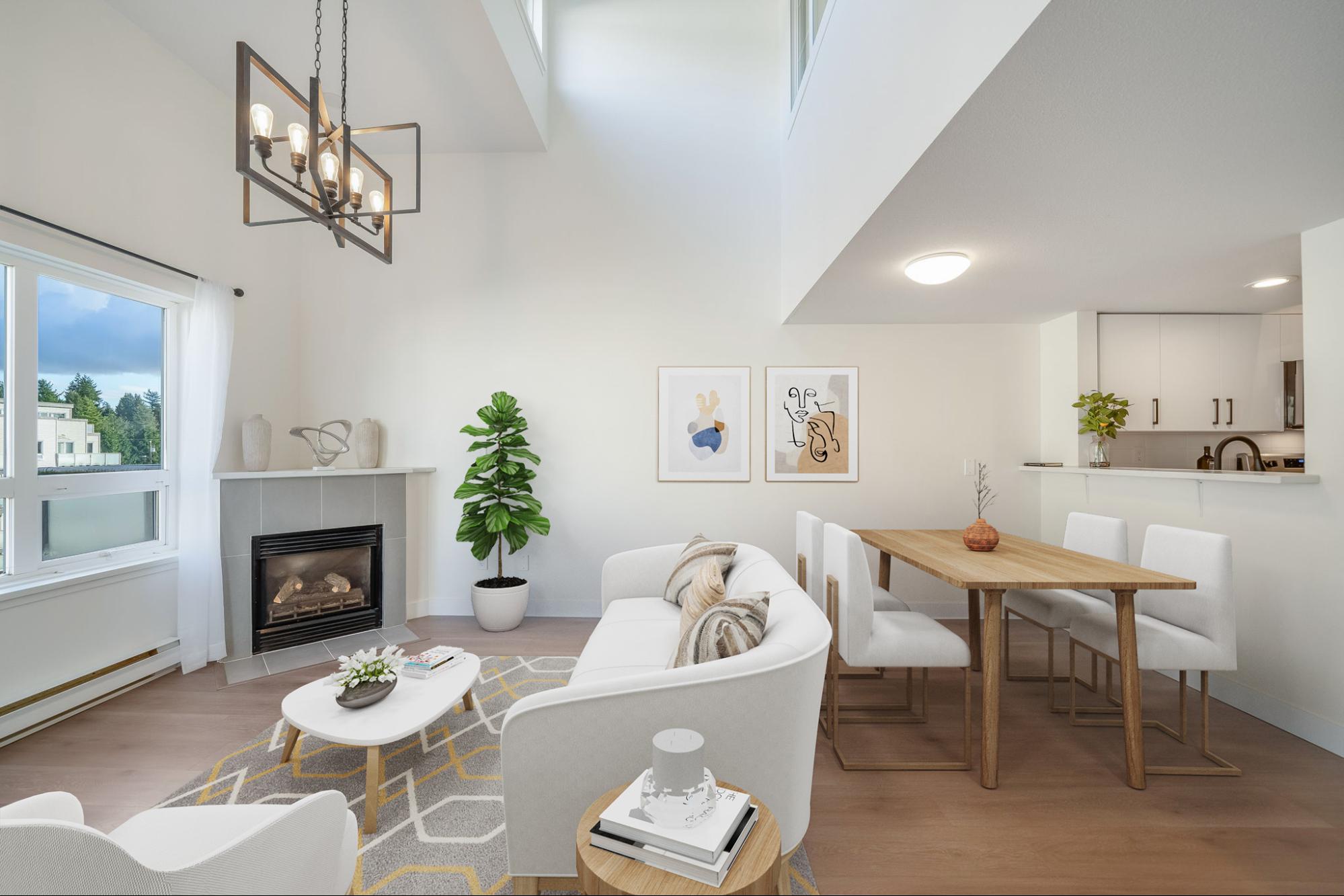 Bright, staged living and dining room with natural light